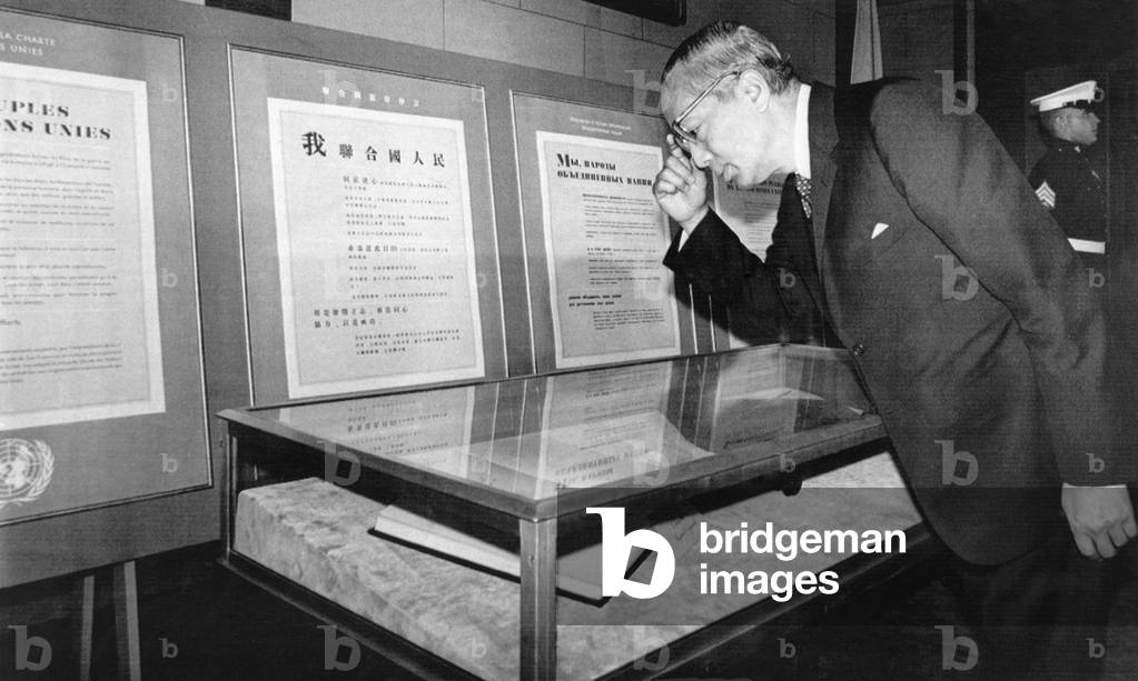 United Nations secretary general U Thant examining the UN charter, displayed in observance of its 25th anniversary. San Francisco, California, June 26, 1970