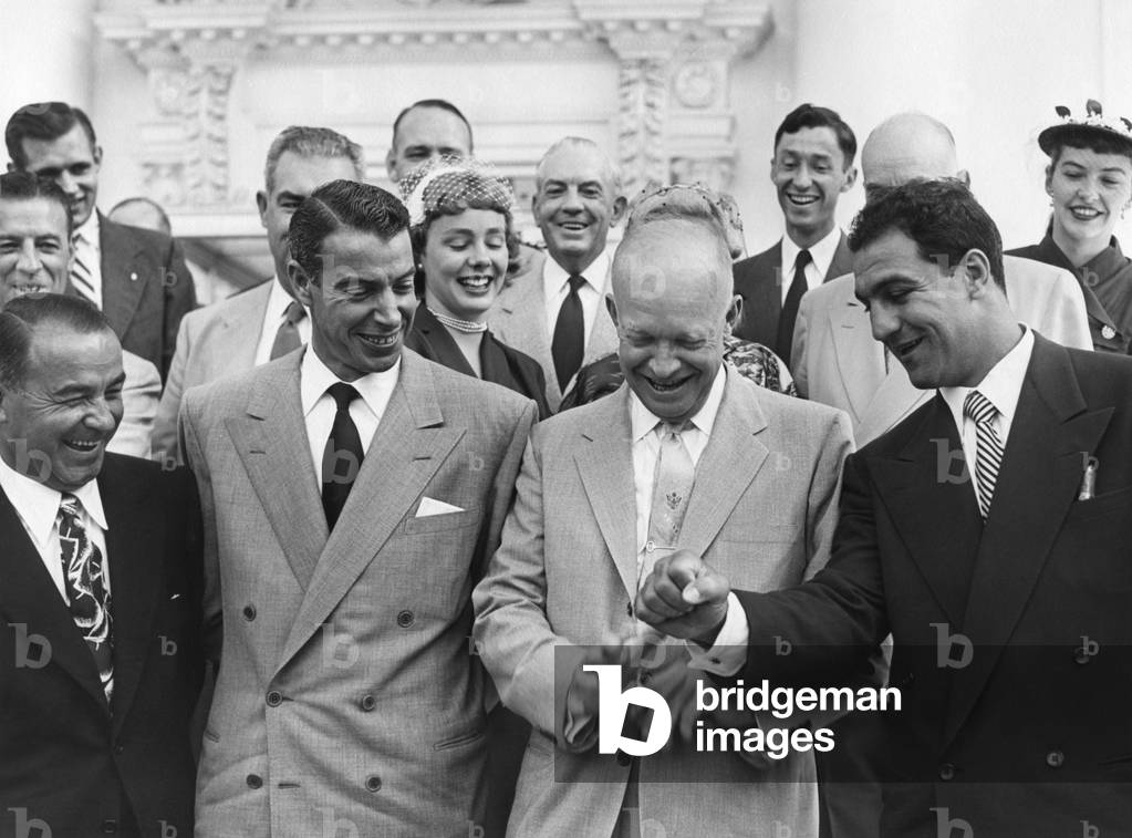 President Eisenhower with baseball great Joe DiMaggio, and boxing champion, Rocky Marciano. June 6, 1953. They were among 45 sports champions invited to attend the Congressional Baseball Game.