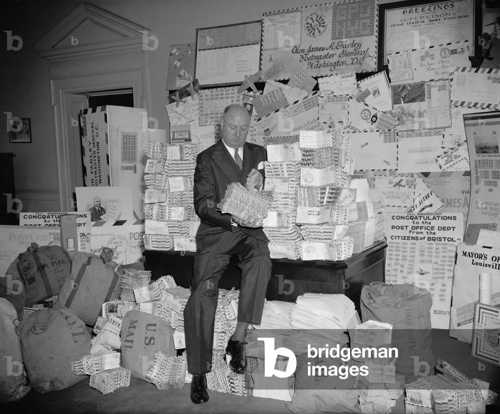 James Farley inspects letters sent during airmail week celebration. June 15, 1938. The Postmaster General and Chairman of the Democratic National Committee had ambitions to be the 1940 Presidential nominee, which were dashed when FDR ran for a third term