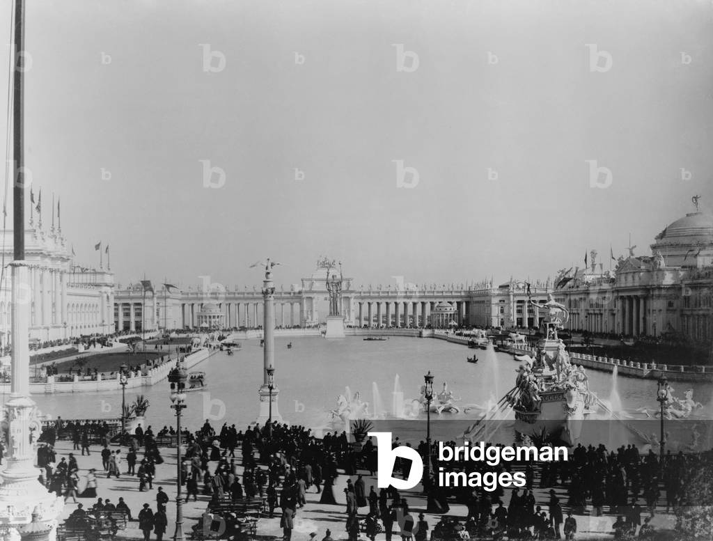 WORLD'S COLUMBIAN EXPOSITION, Chicago 1893. Architects by Daniel Burnham and Frederick Law Olmsted, used Beaux Arts classical architecture and decorative styles. Photo shows the Lagoon with statues and Agricultural Building on right
