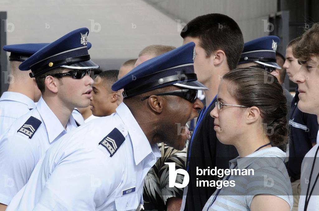 A Cadet 2nd Class yells instructions at new basic cadets during cadet in-processing at the US Air Force Academy in Colorado Springs Colorado. June 25 2009