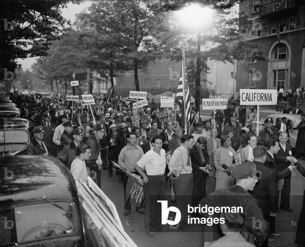 WPA workers protest lay-offs in Washington, D.C. Aug. 24, 1937. Some of the over 2000 dismissed WPA workers marching to the White House, Capitol, and Harry Hopkins' office