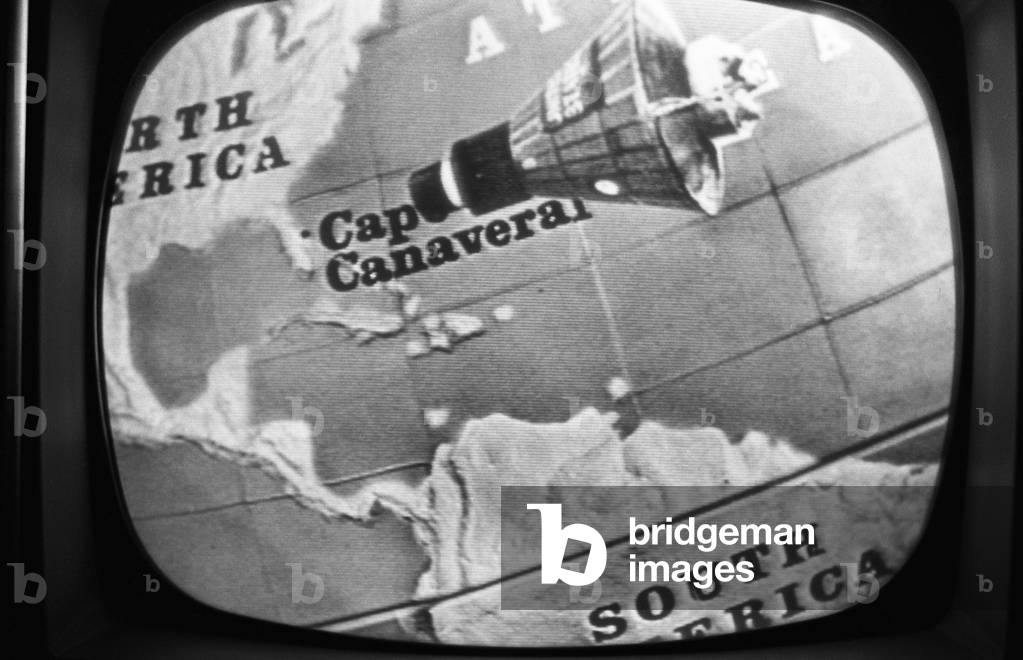 Television screen animation of John Glenn's Friendship 7 space capsule approaching North America, during his three orbit space flight on Feb. 20, 1962