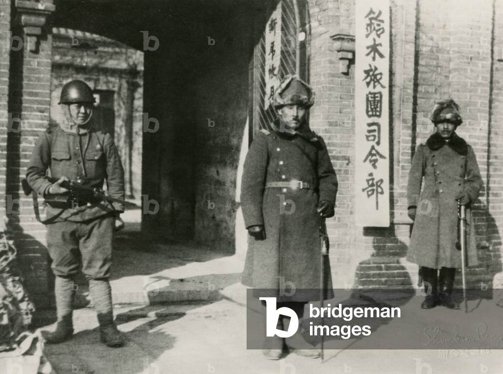Major Gen. Sosaku Suzuki (center), head of Japanese army at his headquarters in Manchukuo (Manchuria). Feb. 7, 1933. Suzuki was killed in action in the Philippines on April 19, 1945