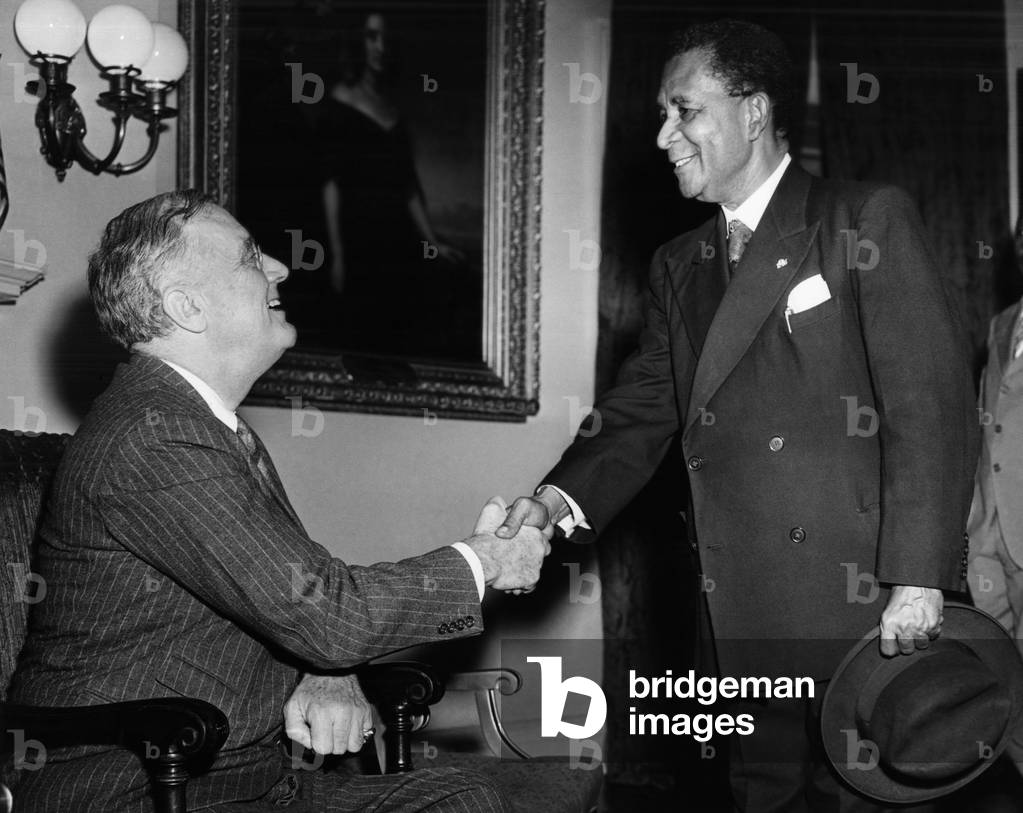 FDR Presidency. US President Franklin Delano Roosevelt greets Liberian President Edwin Barclay at the White House, Washington, D.C., 1943