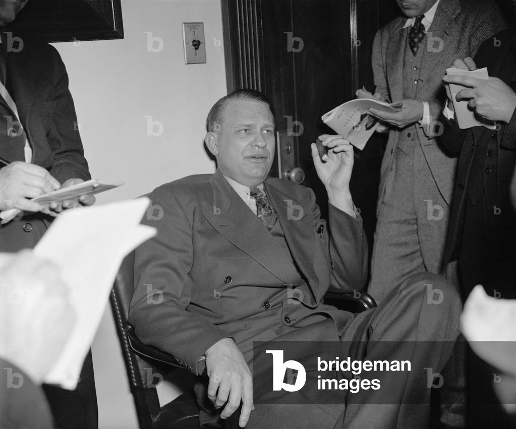 Rep. Martin Dies, HUAC Chairman, talks with reporters, Feb. 1940. From 1938 to 1944 the House Un-American Activities Committee, searched for subversive activities of private citizens, public employees, and organizations suspected of communist or fascist ties