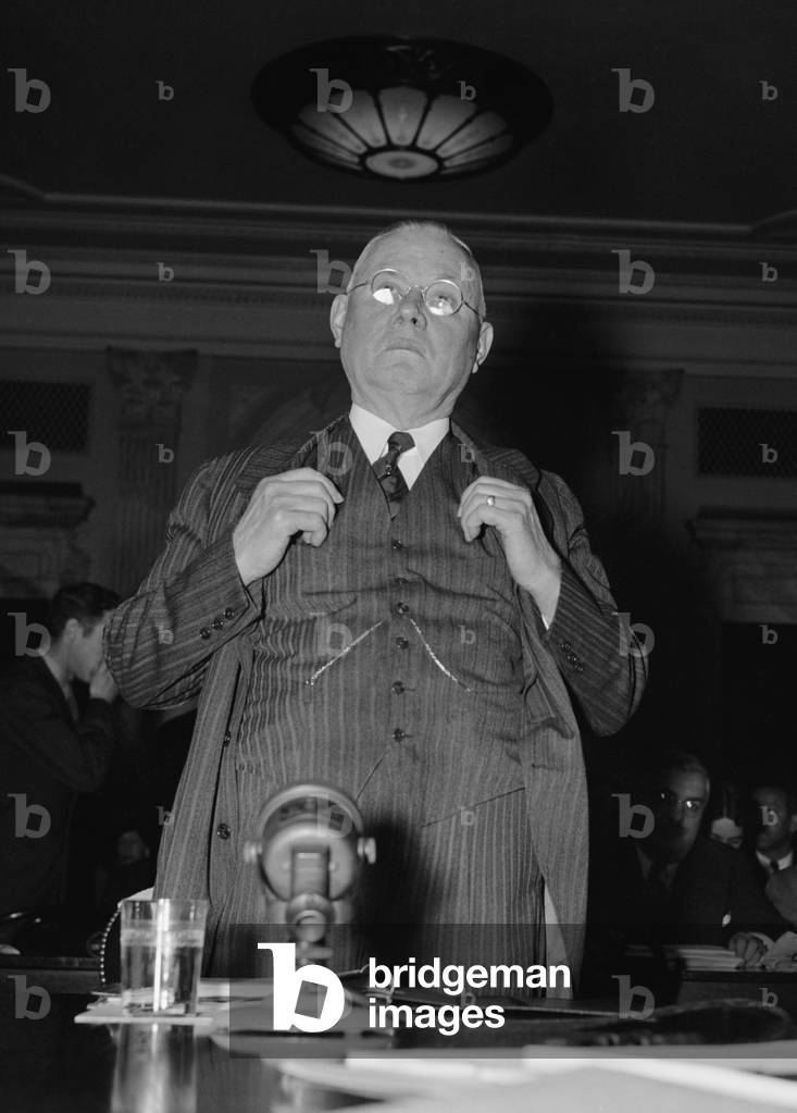 William Green (1873-1952), President of the American Federation of Labor (AFL), before the Senate Education and Labor Committee. He accused the National Labor Relations Board of dictator tactics and bias toward a competing union, the CIO (Congress of Industrial Organizations). May 1, 1939