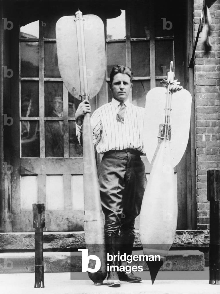 Lester P. Barlow with two bombs he invented, Jan. 22, 1926. He invented a 'flying torpedo' and 'bouncing bomb'