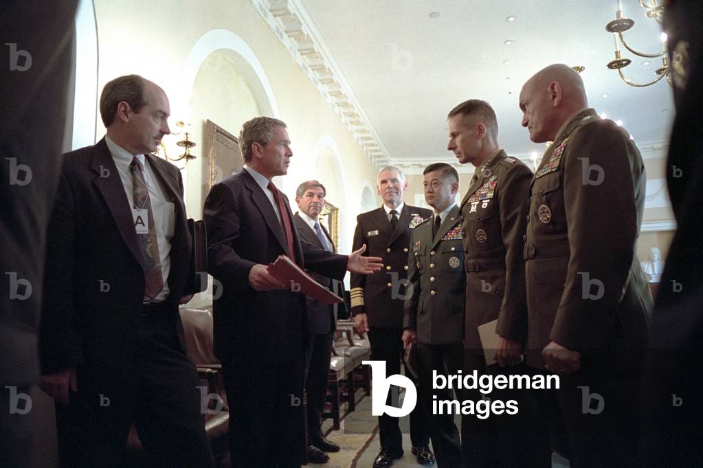 President George W. Bush with Chiefs of Staff, Oct. 24, 2001. Meeting with him are from left: Adm. Richard Mies, Gen. Eric Shinseki, Gen. Peter Pace, and Gen. Michael Williams