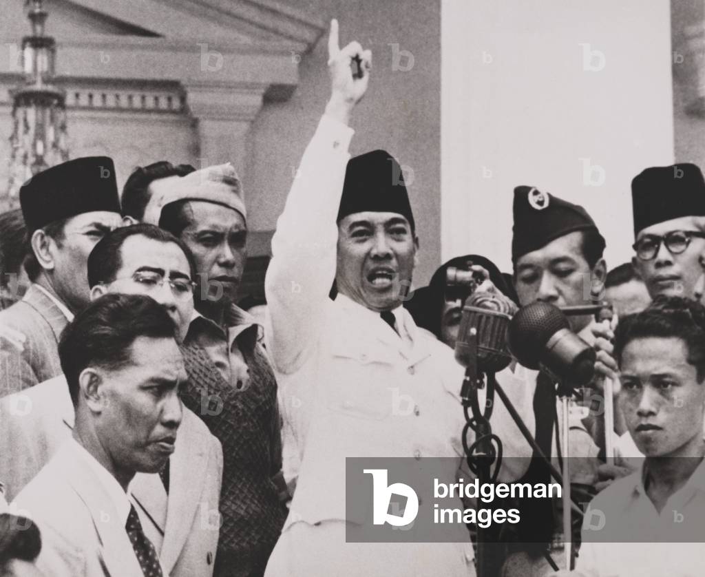 Indonesian President Sukarno, trying to calm thousands of angry demonstrators. Sept. 1950. The crowd demanded the dissolution of Parliament and general elections. Sukarno promised elections as soon as possible, which turned out to be Sept. 29, 1955. - (BS: Indonesian President Sukarno, trying to calm thousands of angry demonstrators. Sept. 1950. The crowd demanded the dissolution of Parliament and general elections. Sukarno promised elections as soon as possible, which turned out to be Sept. 29, 1955. - (BSLOC_2014_15_181)