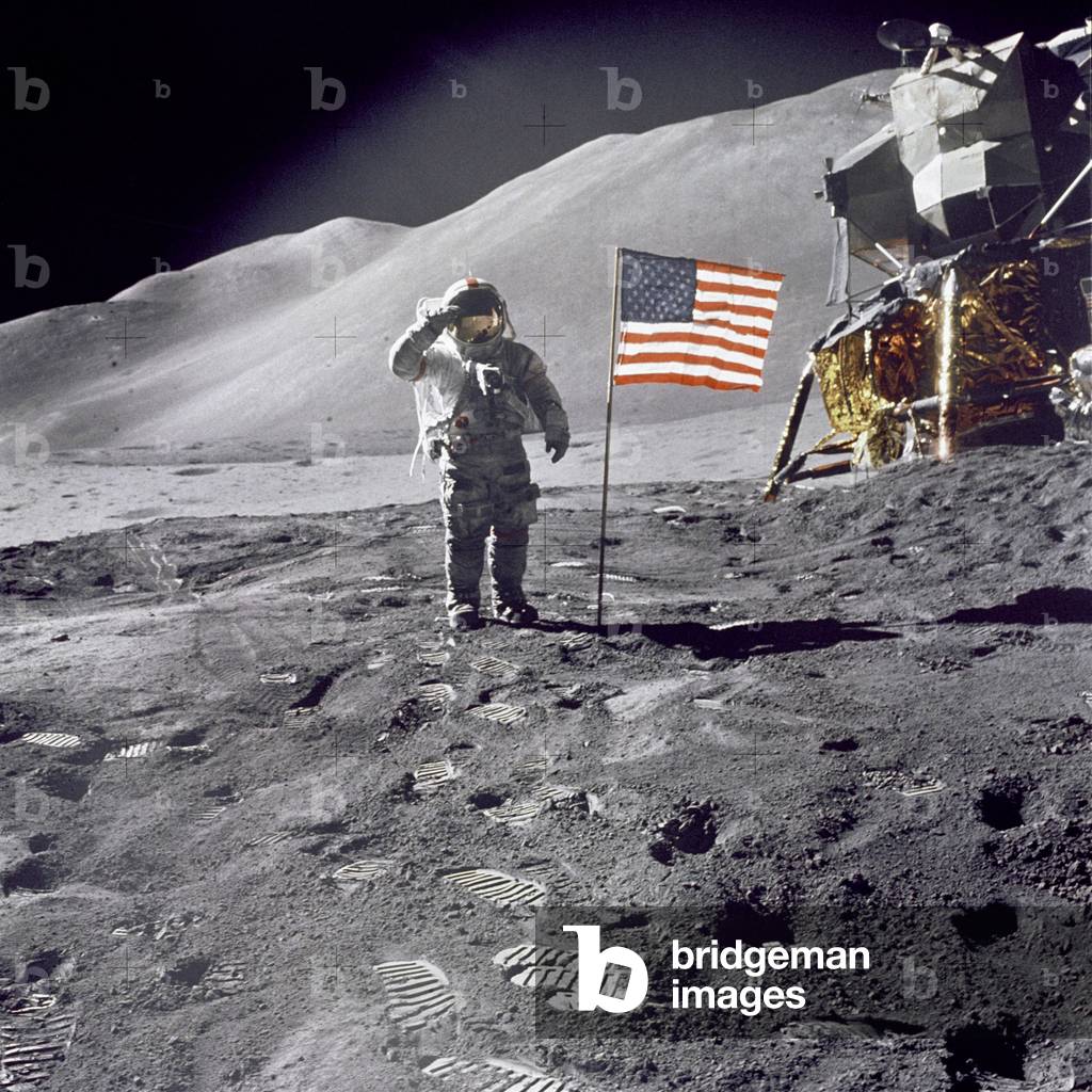 Apollo 15 Astronaut David Scott, gives a military salute to US flag on the Moon. July 30, 1971