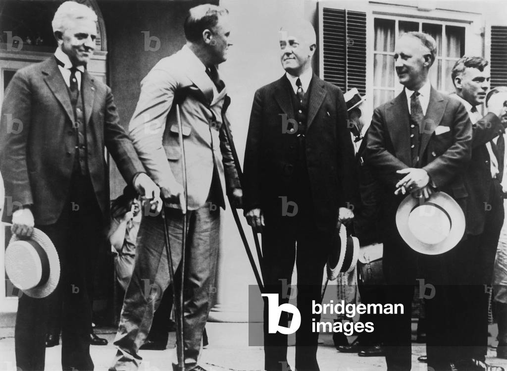 Franklin Roosevelt on crutches, re-engaging with politics after polio. Aug. 7, 1924