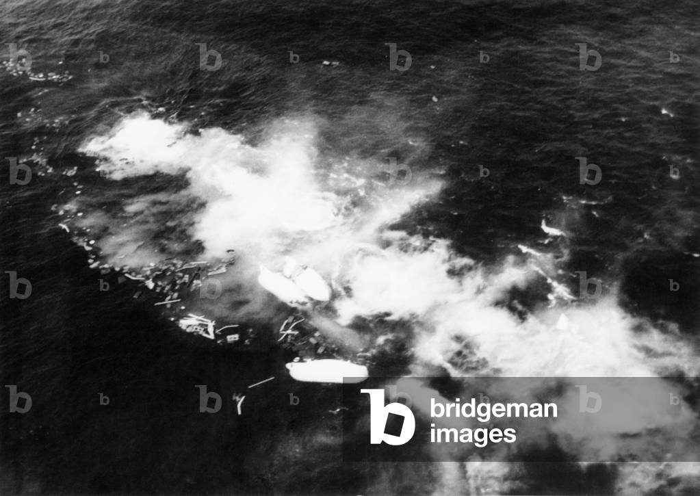 ANDREA DORIA, the Italian ocean liner is sinking in the ocean, 60 miles off of Nantucket Island, July 25, 1956, after its collision with the Swedish liner, Stockholm, at 11:10 PM.