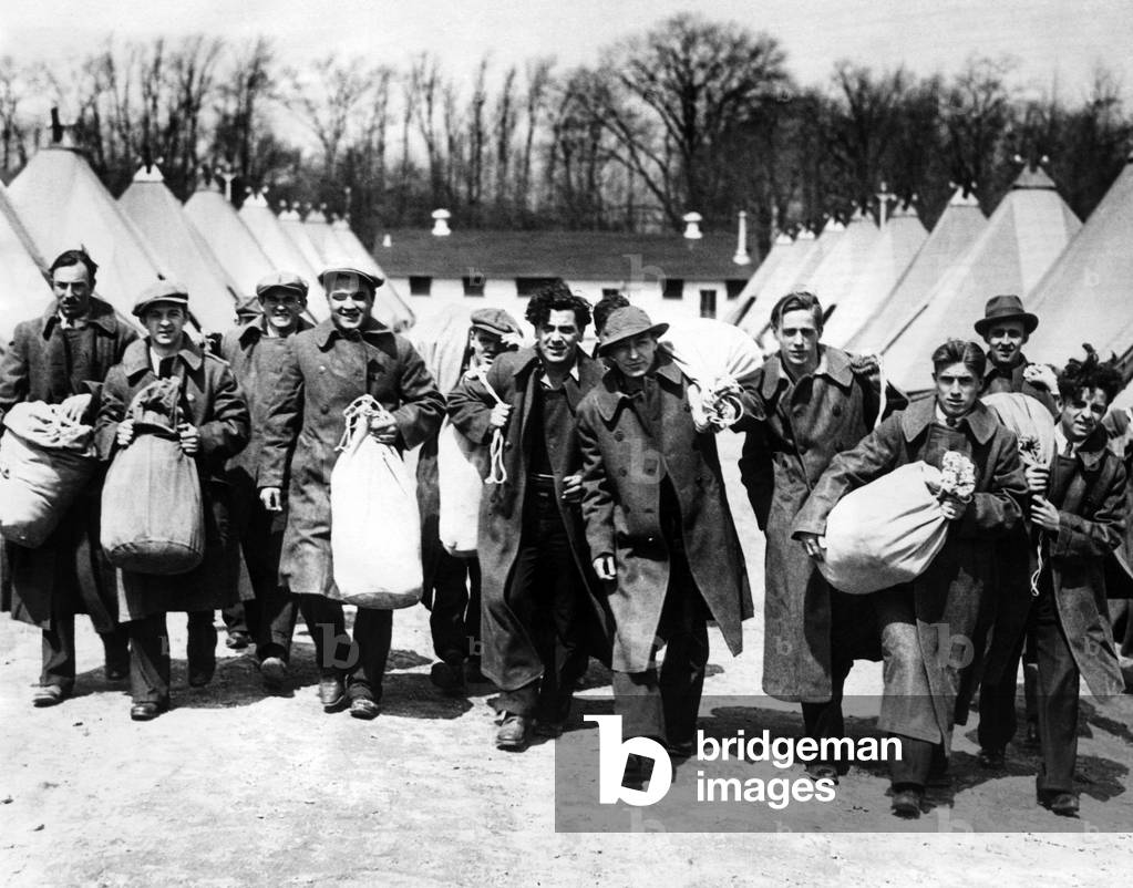 Unemployed workers from Philidelphia arrive in Fort Hoyle Maryland to be given jobs in President Roosevelt's Forest Conservation Corps. ca 1933