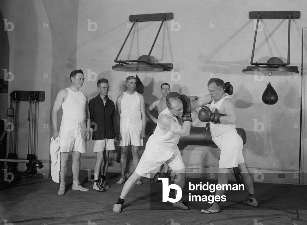 Congressional boxing match with spectators at the House Gymnasium in the Capitol. Dec. 15, 1923