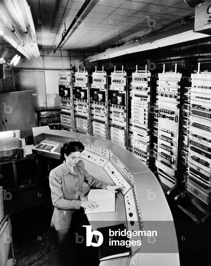 Female operator at the console of the 'Raydac', Raytheon Digital Automatic Computer. August 2, 1952