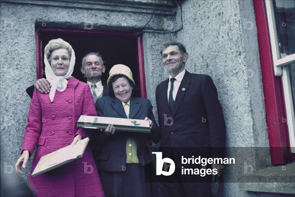 First Lady Pat Ryan Nixon with villagers in Ireland. Her father's parents immigrated from County Mayo before 1865. October 1970