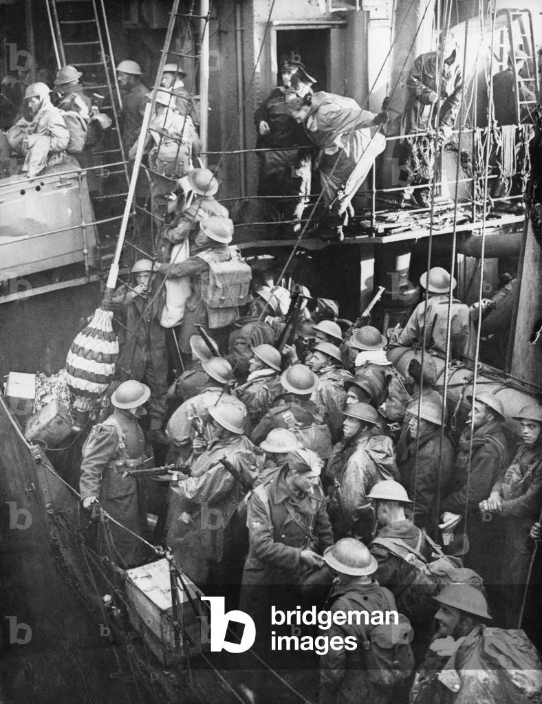British Expeditionary Force soldiers board a destroyer at Dunkirk, France. On the English Channel they faced attack by German shore batteries, underwater mines, surface vessels and the Luftwaffe. World War 2. May 26-June 4, 1940