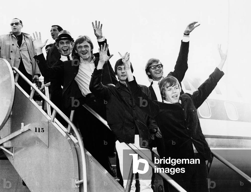 Herman's Hermits arrive in New York from a tour of Japan, Feb. 1966. At the time, the group out-ranked the Beatles in worldwide popularity polls. They were in the U.S. to promote their first motion picture musical, HOLD ON. Bottom to top: Peter, Keith, Lek, Carl, and Barry