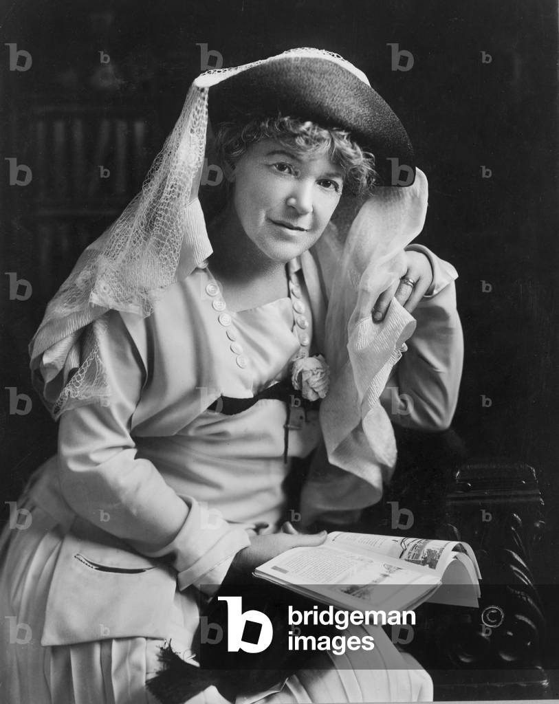 Ella Wheeler Wilcox (1854-1919), author and poet whose popular works incorporated a Victorian religion, morals, and even subtle eroticism. Photo, c. 1917