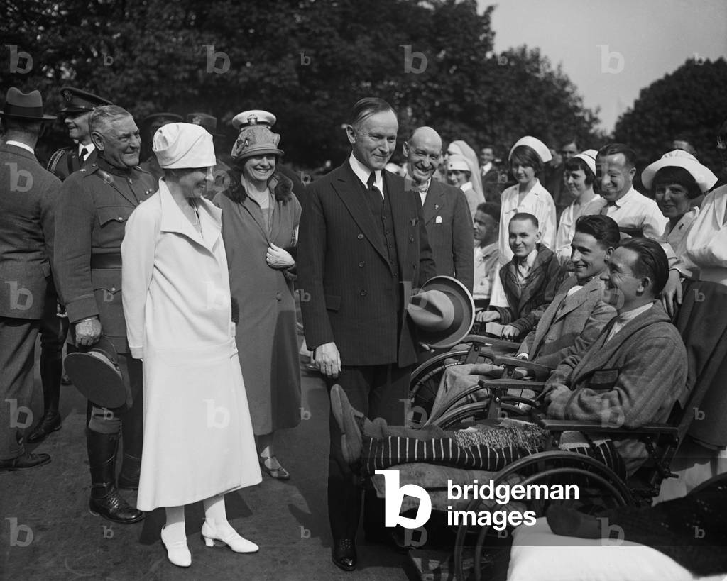 President Calvin Coolidge and First Lady visiting disabled World War 1 veterans. c. 1923-28