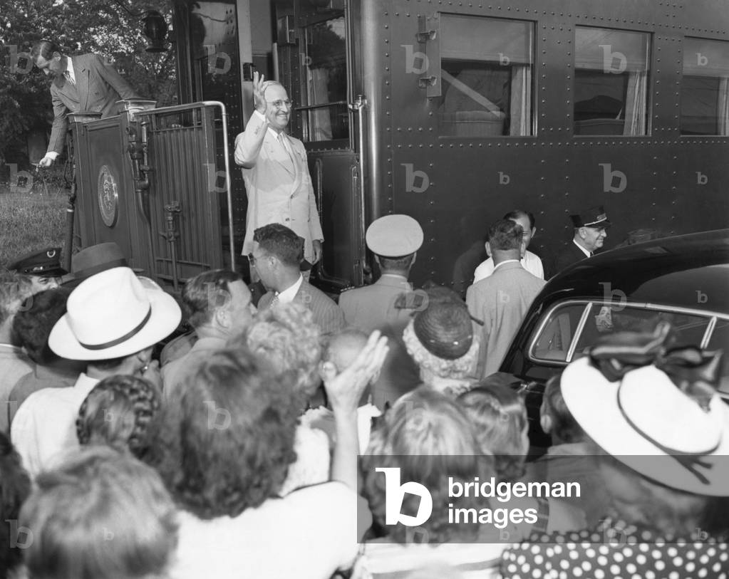 President Harry Truman on the Presidential train at a campaign stop in Willard, Missouri. July 5, 1948.