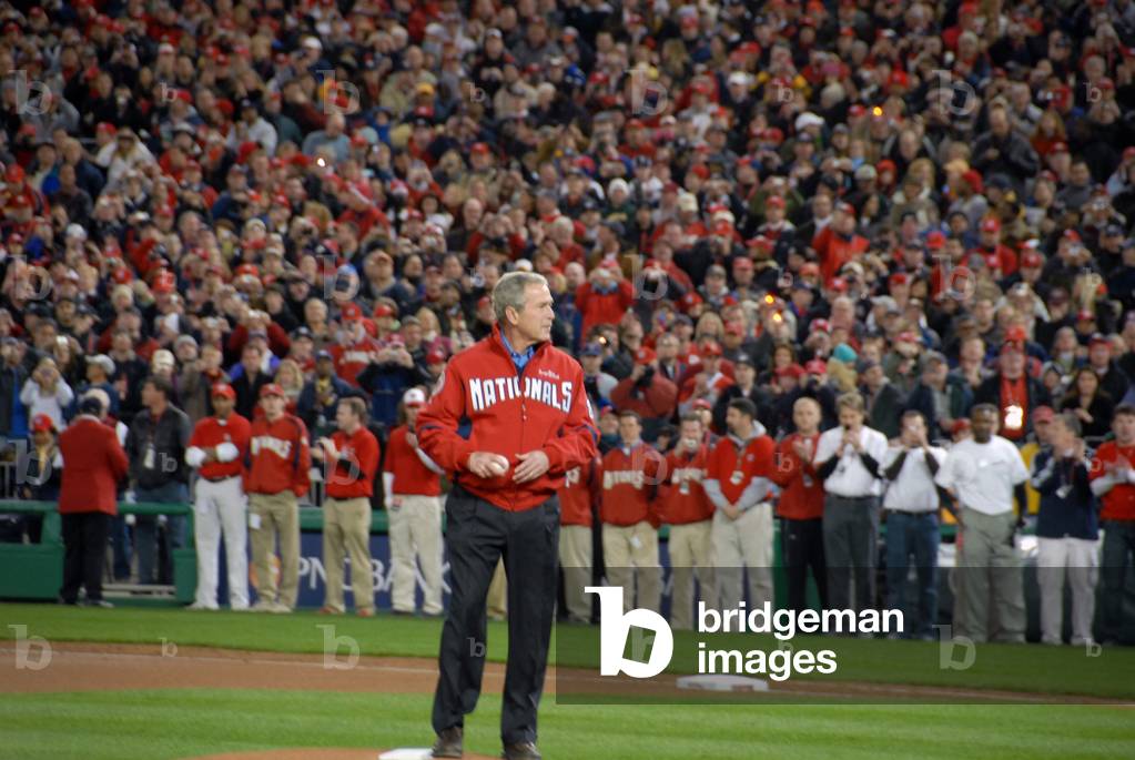 President George W. Bush throws out the first ball of the season opener at Nationals Park in Washington D.C. March 30 2008