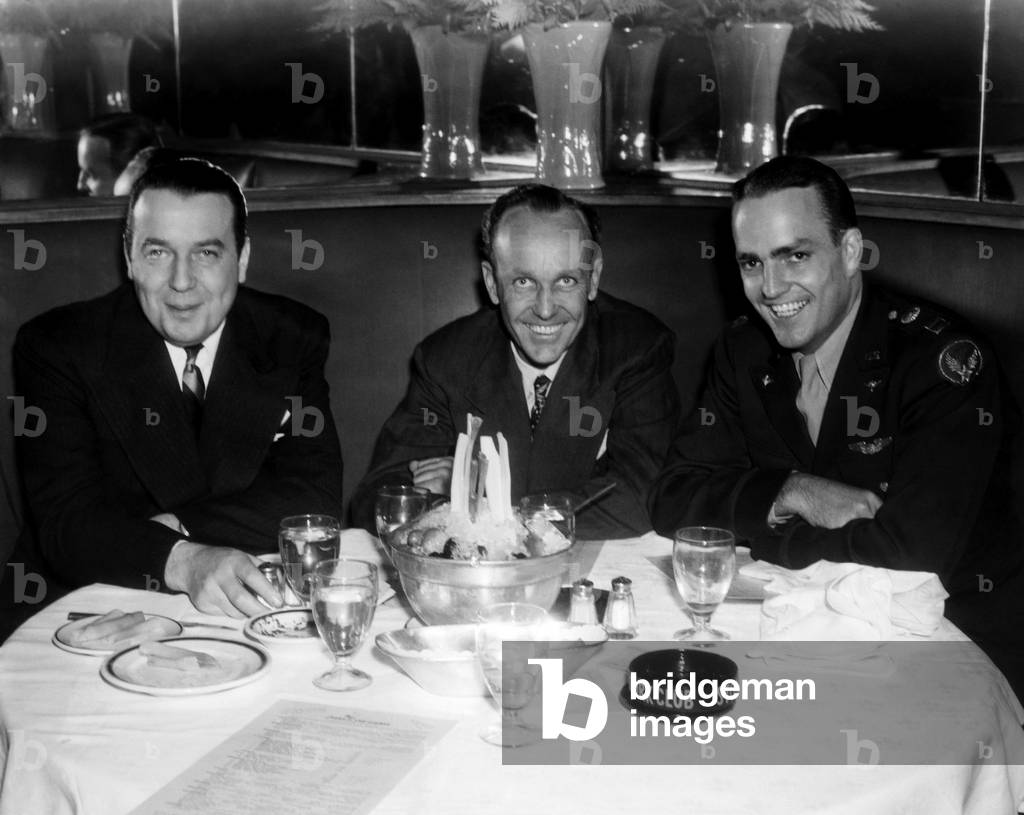 Publisher's sons John Randolph Hearst, William Randolph Hearst Jr. and Captain Randolph Hearst dine at Sherman Billingsley's Stork Club, ca 1945