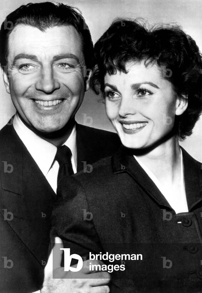 American actor Robert Taylor (left), with wife German actress Ursula Thiess, 1954.