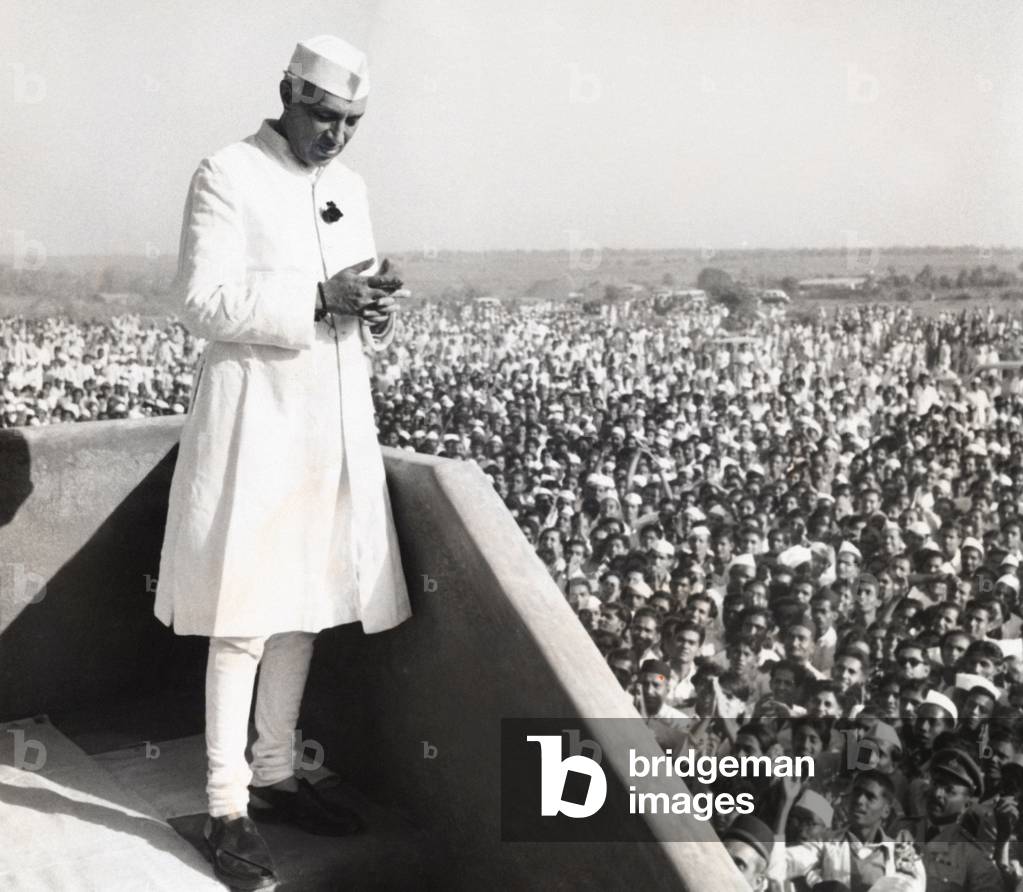 Jawaharlal Nehru, Prime Minister of India, addressing a crowd at Parnera, India. March 23, 1952. The occasion was the opening of a factory to make dyes and drugs in a joint Indian-American business venture