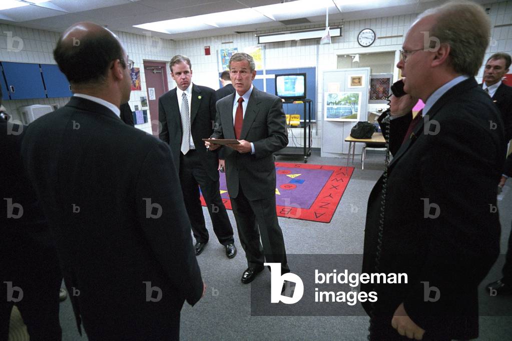 President George W. Bush with senior staff after learning of the 9-11 Terrorist Attacks. He is still at Emma E. Booker Elementary School in Sarasota, FL. Senior staff include, from left: Ari Fleischer, Press Secretary; Dan Bartlett, Deputy Assistant to the President, and Karl Rove, Senior Adviser