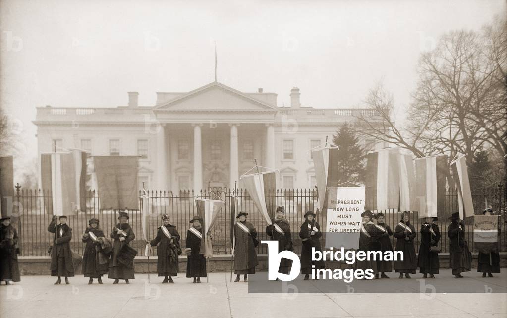 National Women's Party demonstration in front of the White House in 1918. The banner protests Wilson's failure to support women's suffrage