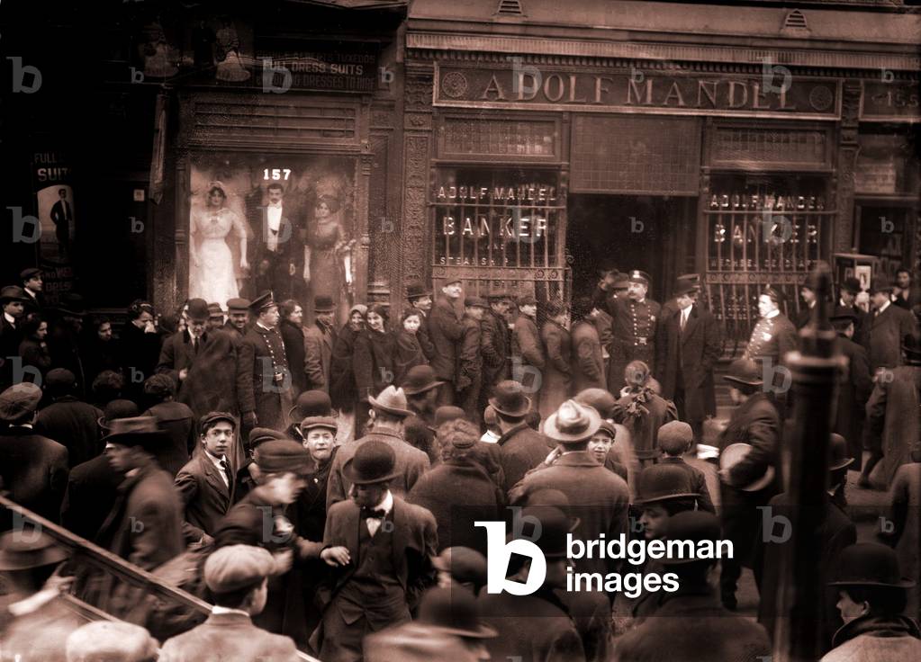 Police keep order during a run on the Adolf Mandel Bank on New York City's Lower East Side. February 16, 1912