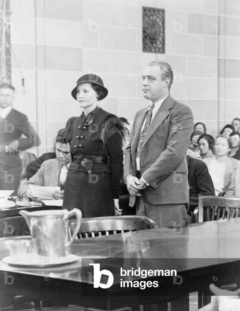 George 'Machine Gun' Kelly (1897-1954), and wife, Kathryn, in court on October 13, 1933 receiving life sentences for the kidnapping of Charles F. Urschel. Kelly would die in prison in 1954. Kathryn was released from prison in 1958