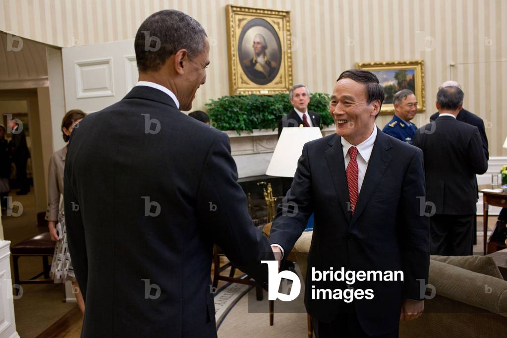 President Barack Obama greets Chinese Vice Premier Wang Qishan in the Oval Office. May 9, 2011. In 2013 he became the public leader of General Secretary Xi Jinping's anti-corruption campaign