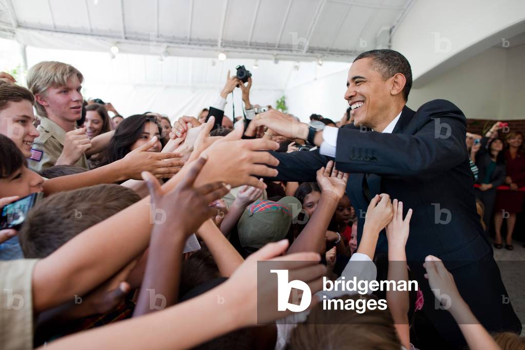 President Barack Obama greets young people during a visit to the U.S. Ambassador's residence in San Salvador. March 23 2011. (BSWH_2011_8_280)