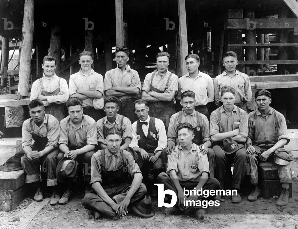 Twenty five Native Americans from the Carlisle Indian College, working in Hog Island shipyard. Philadelphia, Pennsylvania. World War I. Sept. 4, 1918