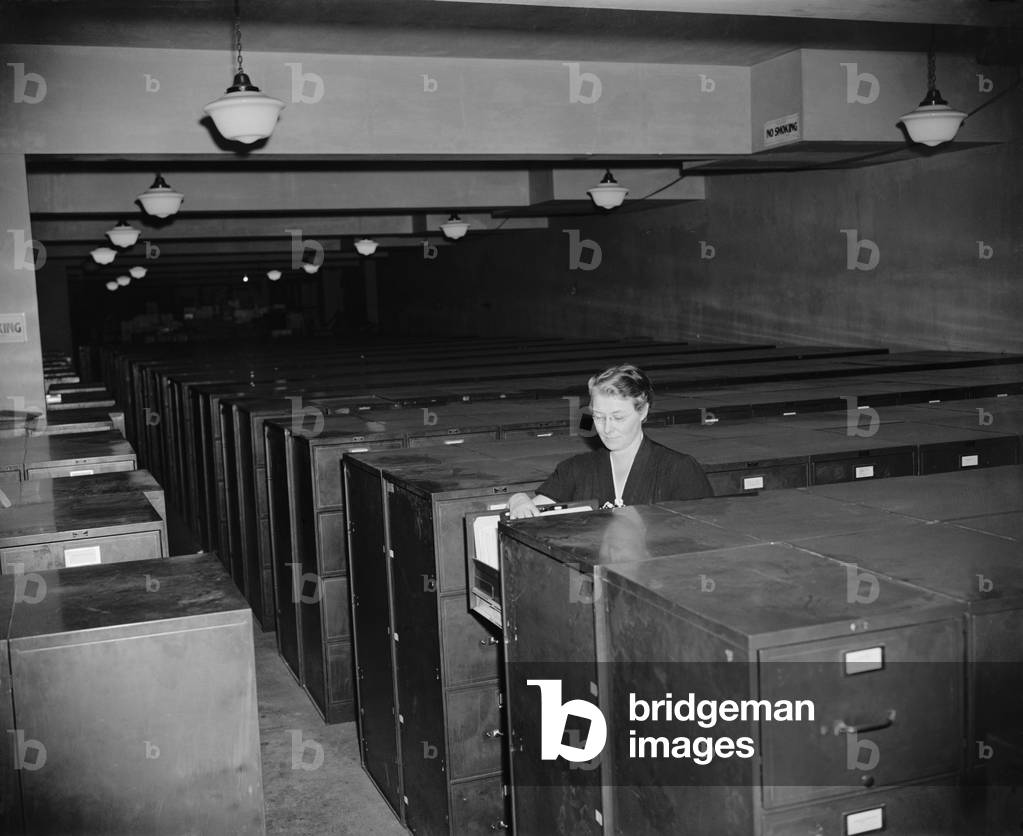 Remains of the defunct NRA three years after its closing. One manager with seven assistant attends over half an acre of filing cabinets. The 40,000,000 records were destined for the National Archives. Oct. 26, 1938
