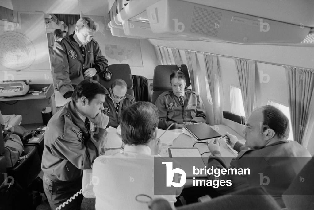 President Richard Nixon's staff aboard Air Force One during the 1972 presidential campaign. Group includes Ronald Ziegler Dwight Chapin H.R Haldeman and John Ehrlichman