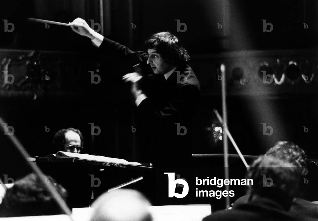 Andre Previn, composer and conductor, with the Pittsburgh Symphony Orchestra, c.1977