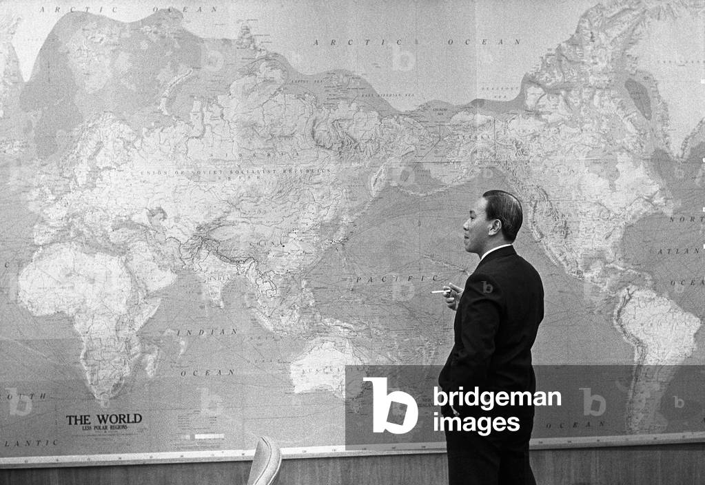 President Nguyen Van Thieu of South Vietnam standing in front of world map. Thieu was in Hawaii, meeting with the US President, during the last year of the Johnson Administration. Johnson's efforts to negotiate a settlement with North Vietnam left Thieu in a precarious position. July 19, 1968