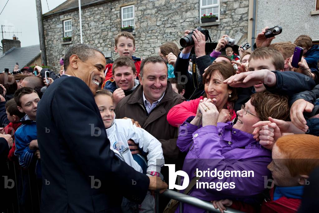 Irish crowds greet President Barack Obama along Main Street in Moneygall, Ireland, May 23, 2011