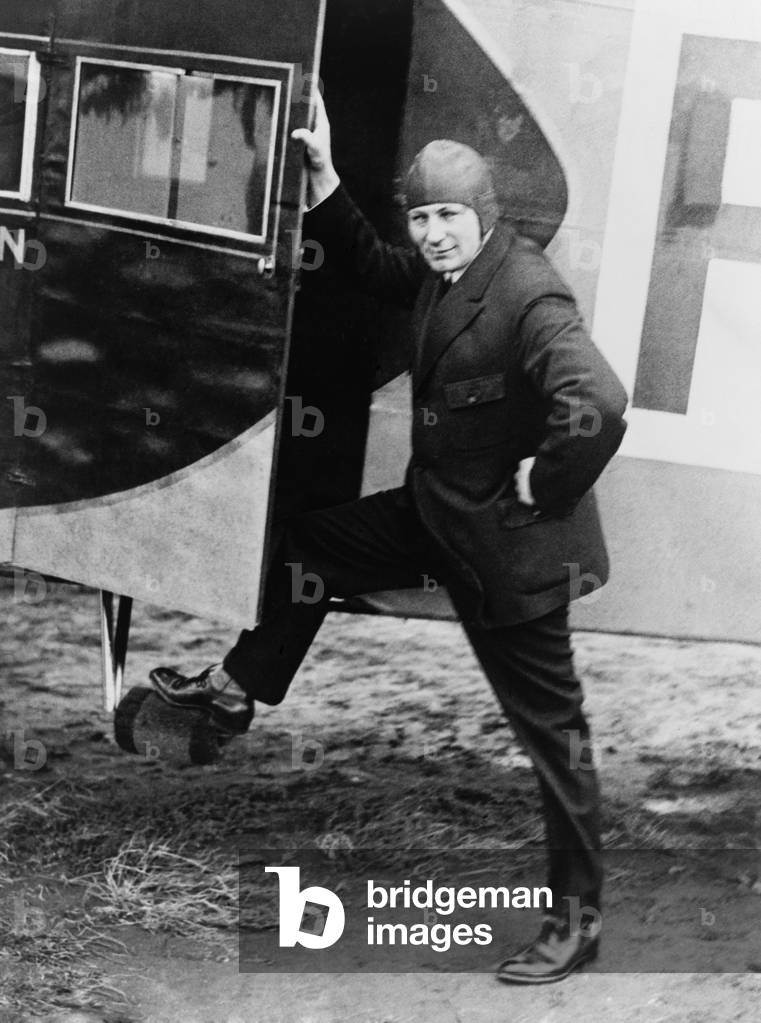Anthony Fokker (1890-1939), aviator and a Dutch-American aircraft manufacturer stepping into one of his planes. 1935