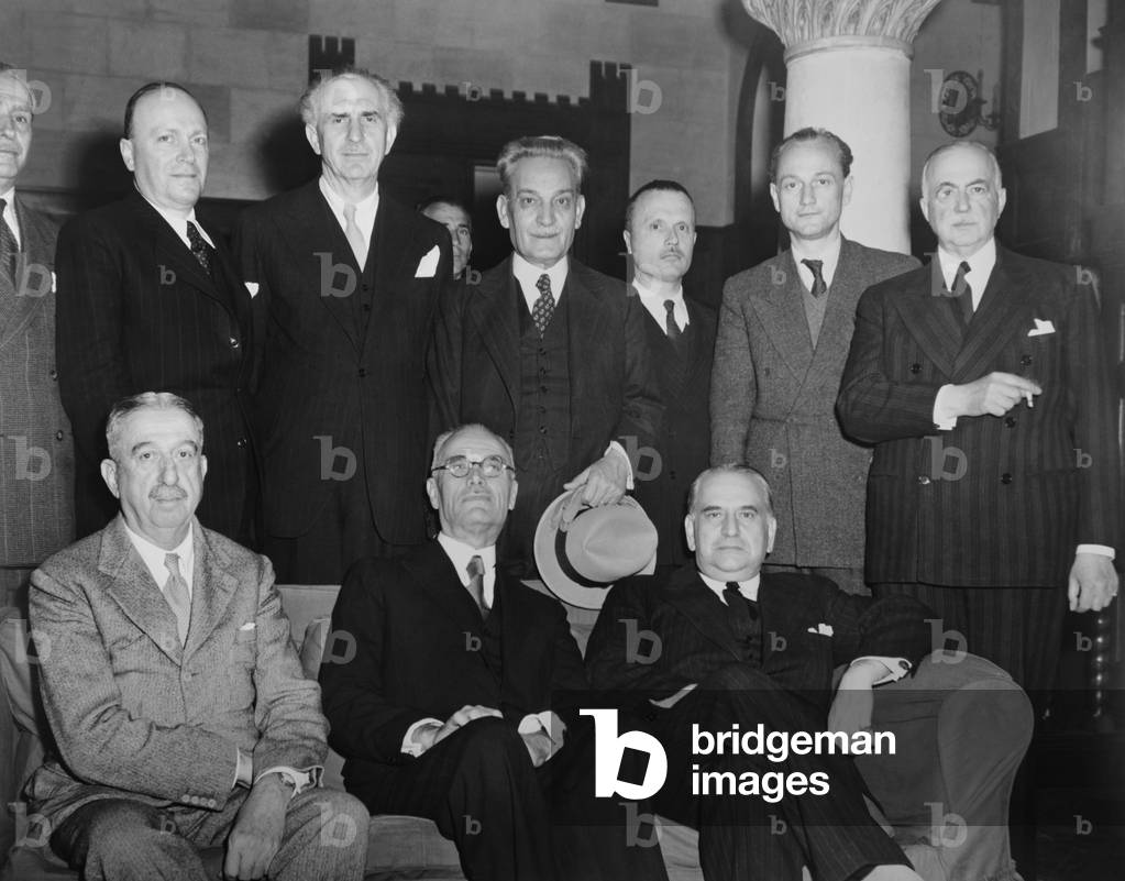 The Greek national elections of March 31, 1946 resulted in right-wing coalition government. Greek cabinet headed by Premier Panayotis Poulitsas, L-R seated: John Theotokis, Interior; Premier Poulitsas; Constantine Tsaldaris, Foreign Affairs. L-R Standing: Stefaros Stefanopoulos, France; George Papandreau; Stelios Gonatas, Communication; Sophocles Venizelos; Panaghiotis Canellopoilos, and Petros Mauromichalis, Defense.