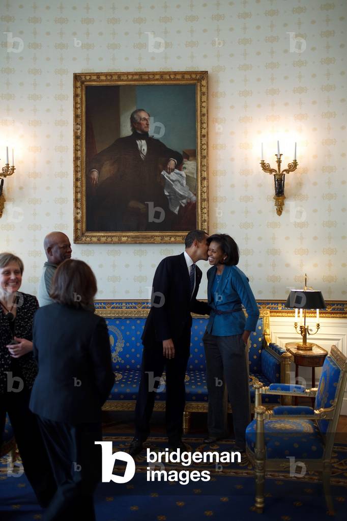 President Obama kisses First Lady Michelle Obama in the Blue Room prior to meeting with the Congressional Black Caucus in the State Dining Room of the White House Feb. 26 2009.,