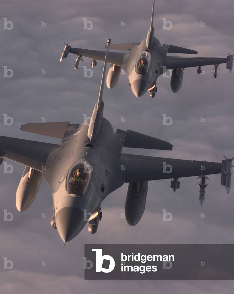 US Air Force F-16C Fighting Falcons fly in formation during a combat mission in the former Yugoslavia during the NATO intervention in Kosovo. April 20 1999