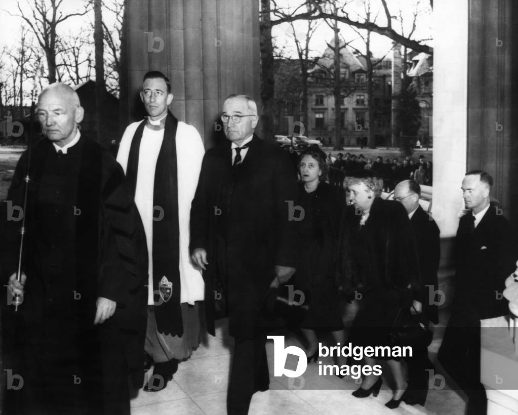 Truman Presidency. From left: Cathedral Verger James Barkley, Cathedral Dean Francis Sayre, US President Harry Truman, Margaret Truman, First Lady Bess Truman, Canadian Ambassador Hume Wrong, British Ambassador Sir Oliver Franks, attending memorial services for the late British King George VI, Washington Cathedral, Washington, D.C., February, 1952