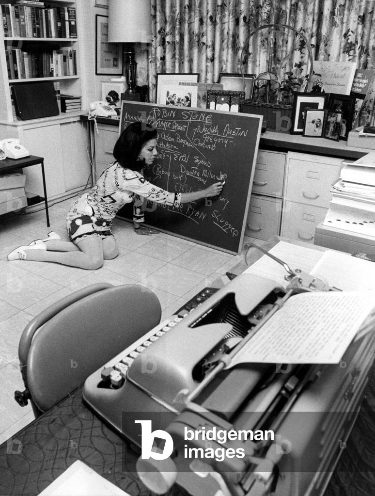 Jacqueline Susann charting out her novel-in-progress, The Love Machine, in her writing room in her Central Park South apartment, 1969