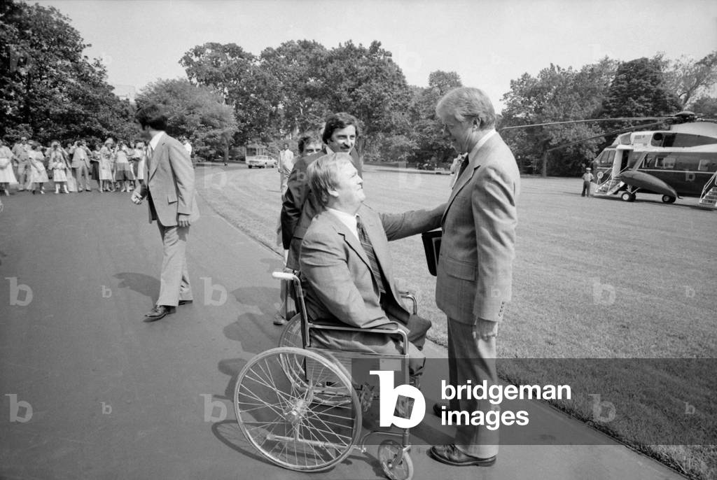 President Carter with Max Cleland b. 1942 a disabled Vietnam veteran who served as Administrator of Veterans Affairs in the Carter Administration. c. 1977-1980