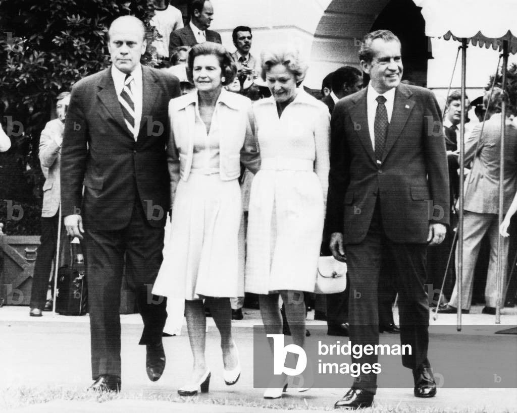 Gerald Ford Inauguration. From left: US President-Elect Gerald Ford and future First Lady Betty Ford walk with First Lady Patricia Nixon and President Richard Nixon shortly before Ford was sworn in as President, Washington, D.C., August 9th, 1974